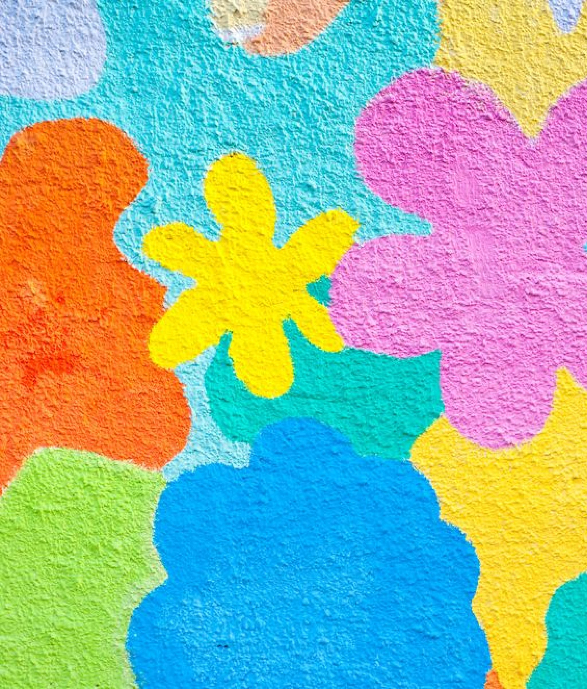 Colorful mural floral pattern painted on stucco